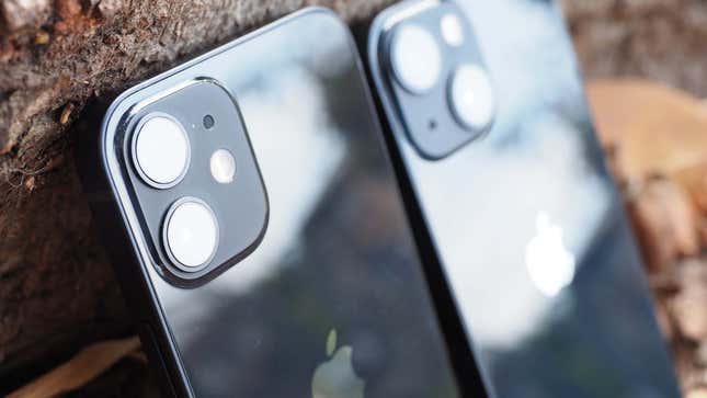 The iPhone 12 Mini (left) has smaller lenses stacked vertically. The 13 Mini (right) has a new lens placement with an overall larger camera module.