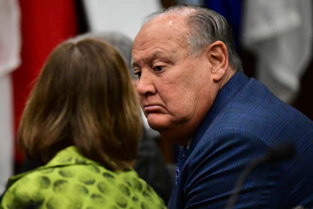 Former FirstEnergy CEO Charles Jones, right, listens to his attorney Carole Rendon inside the courtroom at the Summit County courthouse in Akron, Ohio, on Tuesday, Feb. 13, 2024. Two fired top executives of FirstEnergy Corp. and Ohio’s former top utility regulator have pleaded not guilty in connection with a $60 million bribery scheme. (AP Photo/David Dermer)