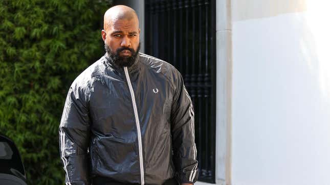 Image for article titled Really, Kanye? New Lawsuit Accuses Rapper Of Wearing This Very Offensive Insignia at Work