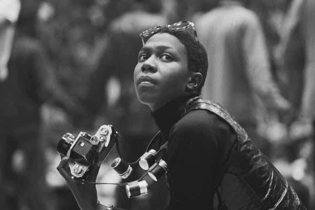 Political &amp; social activist and Black Panther member Afeni Shakur (right) holds a camera as she attends a session of the Revolutionary People’s Constitutional Convention, Philadelphia, Pennsylvania, between September 4 and 7, 1970. The convention was organized by the Black Panther Party to draft a new Constitution of the United States and unify factions of the radical left. (Photo by David Fenton/Getty Images)