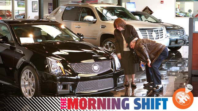 Customers look over Cadillacs offered for sale at a GM dealership May 13, 2009 in Lincolnwood, Illinois. In an attempt to shore up the industry General Motors announced plans to cut 2600 dealerships while Chrysler has made plans to eliminate about 850.