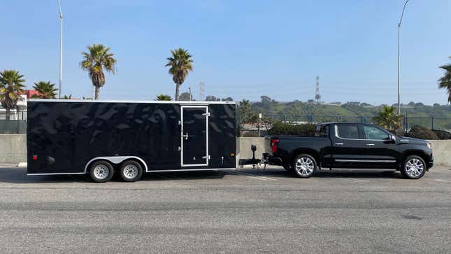 A side-view of how long the Silverado and attached trailer are.