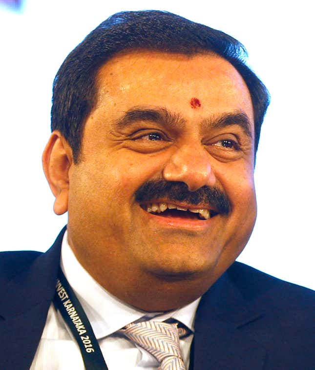 FILE- Adani Group Chairman Gautam Adani attends the &quot;Invest Karnataka 2016 - Global Investors Meet&quot; in Bangalore, India, Feb. 3, 2016. Associates with alleged links to the conglomerate, used offshore entities to invest millions into publicly traded company stocks, a report from a network of investigative journalists Organized Crime and Corruption Reporting Project claimed on Thursday, Aug. 31, 2023. It identified two investors as Nasser Ali Shaban Ahli and Chang Chung-Ling, and said they have longtime business ties to the Adani family and have served as directors and shareholders in the group’s companies. (AP Photo/Rajanish Kakade, File)