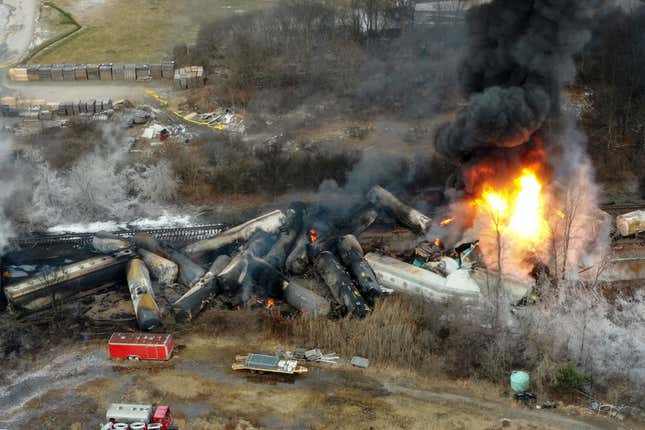 FILE - Portions of a Norfolk Southern freight train that derailed the night before burn in East Palestine, Ohio, Feb. 4, 2023. Passenger railroads nationwide will now be required to install video recorders inside their locomotives, but the head of the National Transportation Safety Board said the new rule is flawed because it excludes freight trains like the one that derailed and caught fire in East Palestine earlier this year. (AP Photo/Gene J. Puskar, File)