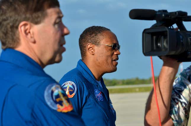 CAPE CANAVERAL, FL - APRIL 16 : Astronauts Mike Barratt (from left) and Alvin Drew of STS-133, the last to fly on space shuttle Discovery, as it sits atop NASA’s Shuttle Carrier Aircraft (SCA) ready to transport Discovery from Kennedy Space Center to the Washington D.C., on April 16, 2012 in Cape Canaveral, Florida. Following the retirement of the shuttle fleet, Discovery will fly on Tuesday, April 17th to Washington for display at the Smithsonian’s National Air and Space Museum. 