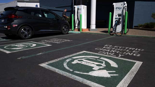 A photo of a Chevrolet Bolt EV at a charging point. 