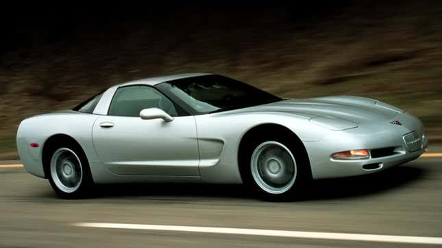 A photo of a silver C5 Corvette. 