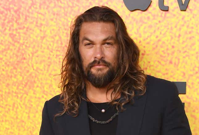 Image for article titled To the Dismay of Women Everywhere, Jason Momoa Shaves His Head to Support the Environment