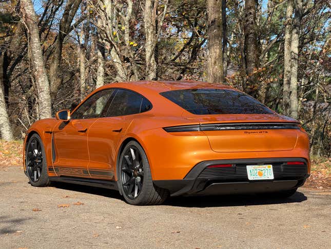 Rear 3/4 view of a Nordic Gold 2025 Porsche Taycan GTS sedan