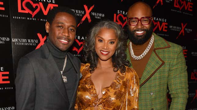 CHAMBLEE, GEORGIA - FEBRUARY 13: Kountry Wayne, Rolonda Rochelle, and Mike Bless attends the Atlanta premiere of “Strange Love” at Regal Hollywood on February 13, 2023 in Chamblee, Georgia. 