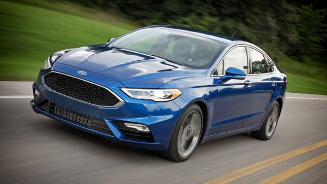 A photo of a blue Ford Fusion Sport sedan. 