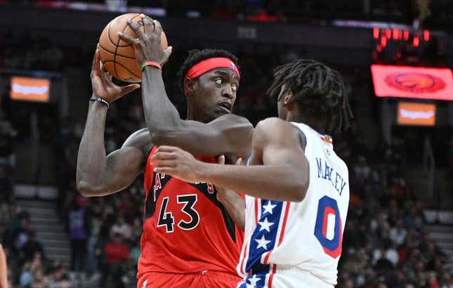 Oct 28, 2023; Toronto, Ontario, CAN;  Toronto Raptors forward Pascal Siakam (43) looks to make a pass as Philadelphia 76ers guard Tyrese Maxey (0) defends in the second half at Scotiabank Arena.