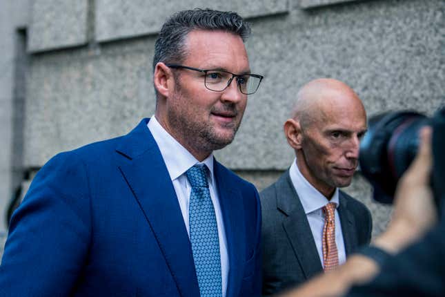 FILE - Trevor Milton, left, leaves the Thurgood Marshall United States Courthouse, Sept. 12, 2022, in New York. In a filing late Tuesday, Nov. 14, 2023, lawyers for Milton, the founder of truck maker Nikola Corp., said he should not face incarceration because his fraud conviction is nothing like the fraud that landed Theranos founder Elizabeth Holmes in prison. (AP Photo/Brittainy Newman, File)