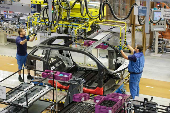 A BMW i3 chassis sits on an assembly line at the automaker's plant in Leipzig in 2013.