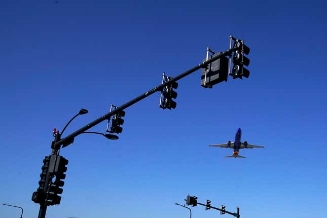 FILE - A flight departs Chicago&#39;s Midway International Airport on Memorial Day, Friday, May 26, 2023, in Chicago. The Treasury Department on Friday, Dec. 15, issued long-awaited guidance around tax credits for aviation fuel that reduces emissions of greenhouse gases compared with conventional fuel. (AP Photo/Charles Rex Arbogast, File)