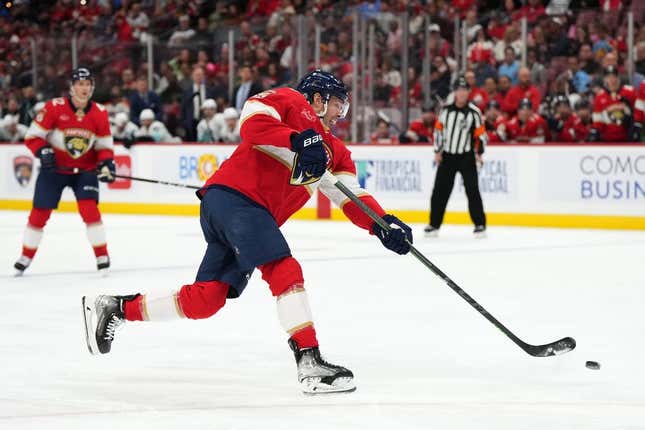 Oct 28, 2023; Sunrise, Florida, USA; Florida Panthers center Carter Verhaeghe (23) shoots the puck against the Seattle Kraken during the second period at Amerant Bank Arena.