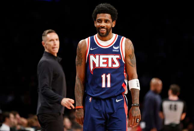 NEW YORK, NEW YORK - APRIL 08: Kyrie Irving #11 of the Brooklyn Nets reacts during the first half against the Cleveland Cavaliers at Barclays Center on April 08, 2022, in the Brooklyn borough of New York City.