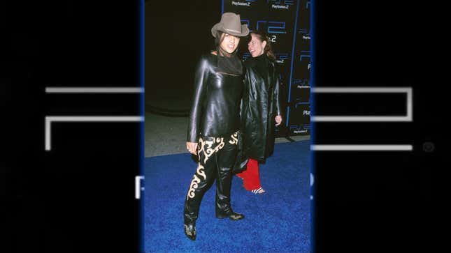 Michelle Rodriguez wears an all-leather cowboy outfit on the blue carpet. 