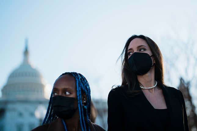 Actress Angelina Jolie, right, walks with her daughter Zahara Jolie-Pitt, left, leave the U.S. Capitol after Jolie spoke at a news conference on the bipartisan modernized Violence Against Women Act (VAWA) on Capitol Hill on Wednesday, Feb. 9, 2022 in Washington, DC. 