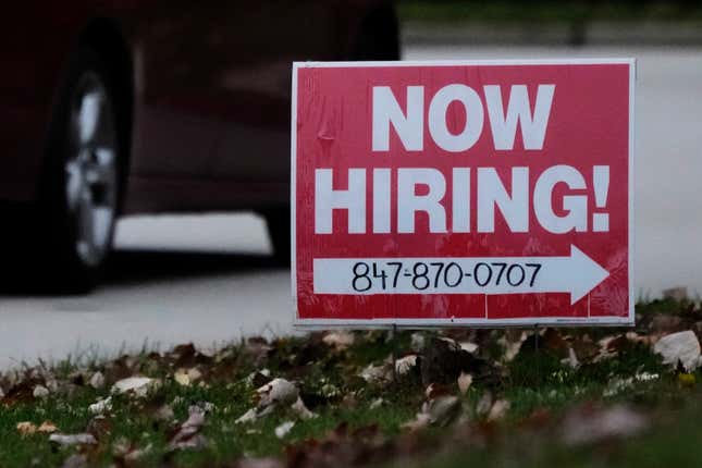 A hiring sign is displayed in Wheeling, Ill., Tuesday, Nov. 7, 2023. On Thursday, the Labor Department reports on the number of people who applied for unemployment benefits last week. (AP Photo/Nam Y. Huh)