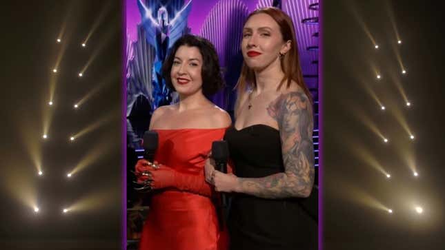 Reb Ford and Megan Everett stand onstage at The Game Awards 2023.
