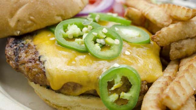 Burger with fresh jalapeno slices