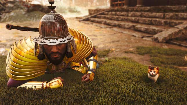 Yasuke crawls next to a cat.