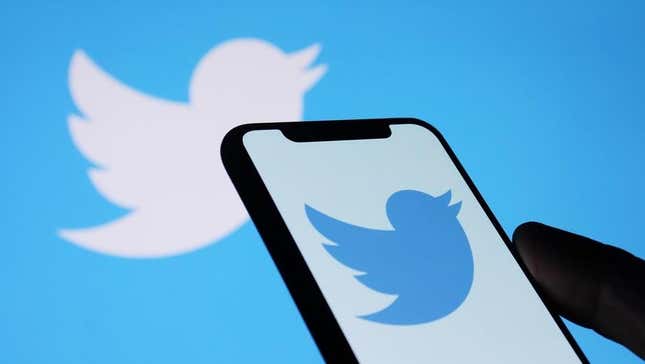 The Twitter logo on a phone