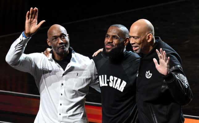 The top three scoring NBA players (L-R) Karl Malone, LeBron James and Kareem Abdul-Jabbar stand on stage during the half time show of the NBA All-Star game between Team Giannis and Team LeBron at the Vivint arena in Salt Lake City, Utah, February 19, 2023. 