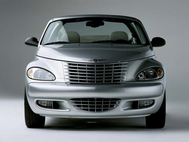 Front image of a silver Chrysler PT Cruiser Convertible in a studio.