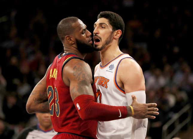 LeBron James #23 of the Cleveland Cavaliers and Enes Kanter #00 of the New York Knicks exchange words in the first half at Madison Square Garden on November 13, 2017 in New York City. 