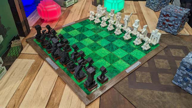 A chess set with Minecraft stylings sits on display.