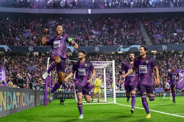 Some footballing gentlemen seem very happy about something. Perhaps they heard some good news about a friend.