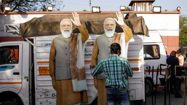 Two campaign cutouts of Indian prime minister Narendra Modi.