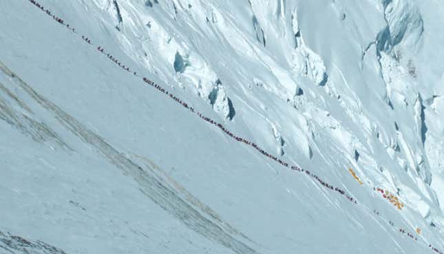 Image for article titled In photos: Mount Everest is like a choked city street these days
