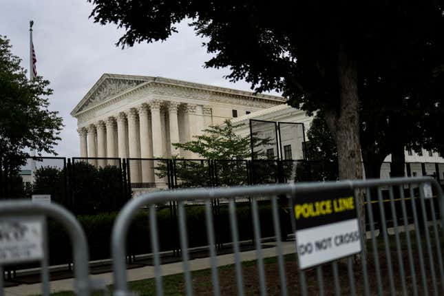  Fencing surrounds the U.S. Supreme Court as it nears the end of its term, June 27, 2022, in Washington, DC. The Supreme Court released three opinions, Concepcion v. the United States, Kennedy v. Bremerton School District, and Ruan v. the United States.