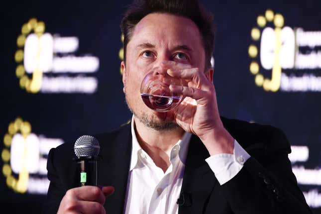 Elon Musk, owner of Tesla and the X (formerly Twitter) platform, gulps water while attending a symposium on fighting antisemitism in Poland.