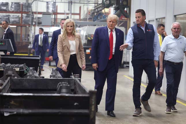 President-elect Donald Trump tours Drake Enterprises, a non-union automotive parts manufacturer, before speaking at a small rally on September 27, 2023 in Clinton Township, Michigan. 