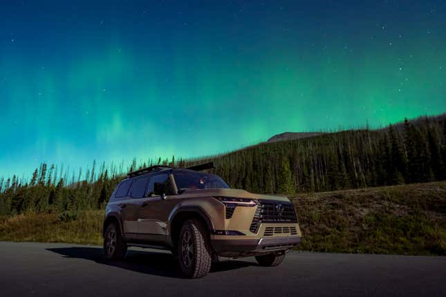 Front 3/4 view of a Lexus GX 550 with the northern lights in the background