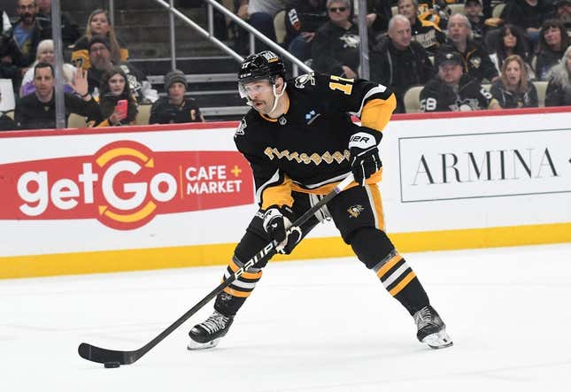 Nov 16, 2023; Pittsburgh, Pennsylvania, USA;  Pittsburgh Penguins right wing Bryan Rust (17) against the New Jersey Devils during the first period at PPG Paints Arena.