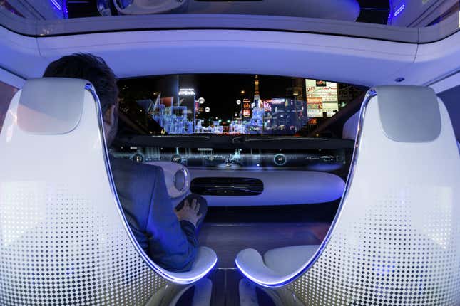 Selecting manual mode would automatically swivel the driver and passenger seats toward the direction of travel, and a steering wheel would emerge for the driver.