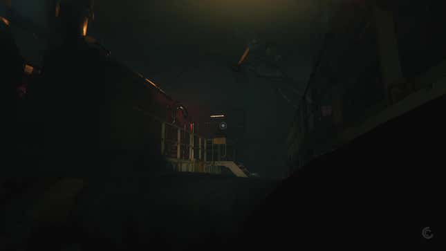 The player looks at a monster in the dark while holding an object.