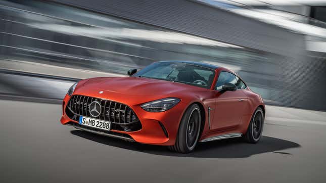 Front 3/4 view of an orange Mercedes-AMG GT63 coupe