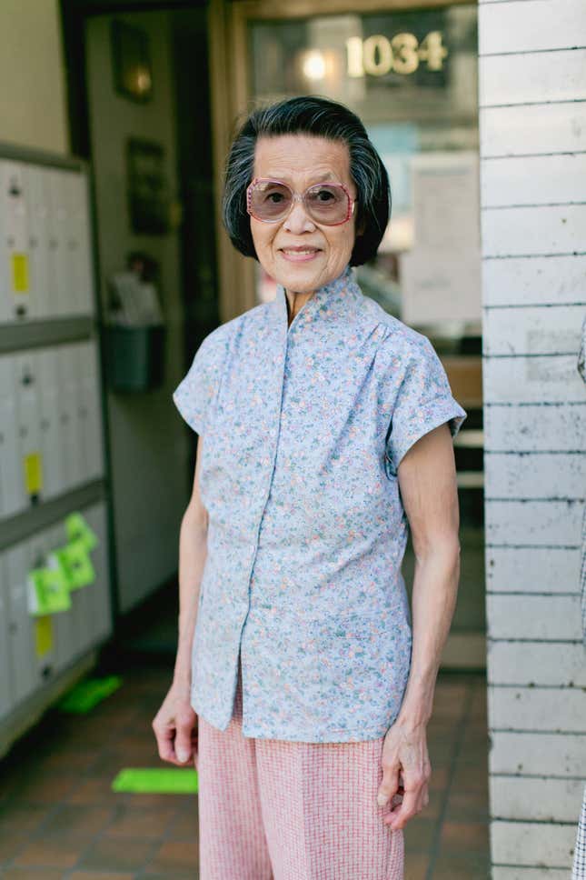Joyce Wing, 89, with a home-sewn outfit.