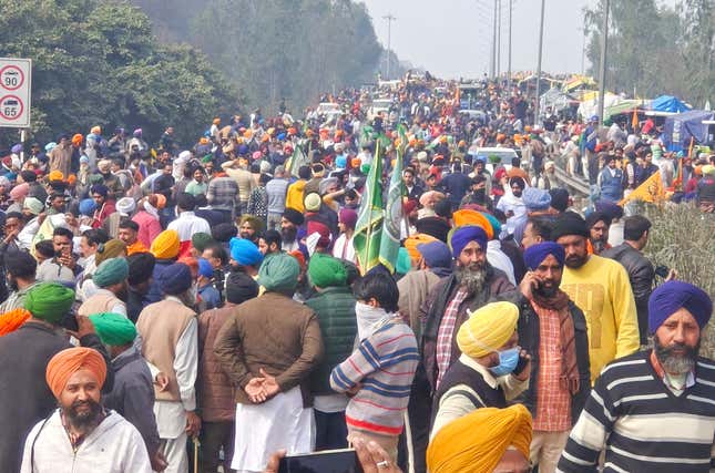 Farmers marching to New Delhi gather near the Punjab-Haryana border at Shambhu, India, Tuesday, Feb.13, 2024. Farmers are marching to the Indian capital asking for a guaranteed minimum support price for all farm produce. (AP Photo/Rajesh Sachar)