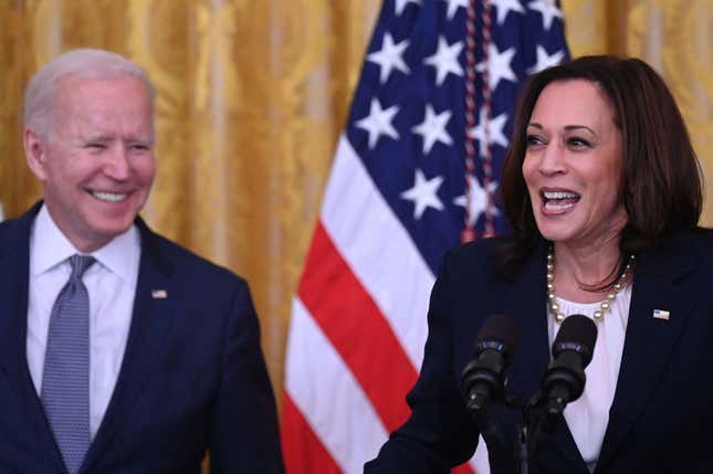 Vice President Kamala Harris speaks as President Joe Biden looks on during an event to mark the passage of the Juneteenth National Independence Day Act