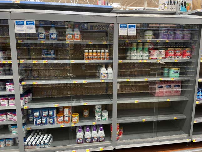 A cabinet of baby formulas is seen at a Walmart store in Raleigh, North Carolina, U.S. June 2, 2022.