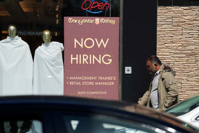 A hiring sign is displayed at a retail store in Chicago on Monday, March 11, 2024. On Thursday, March 14, 2024, the Labor Department reports on the number of people who applied for unemployment benefits last week. (AP Photo/Nam Y. Huh)