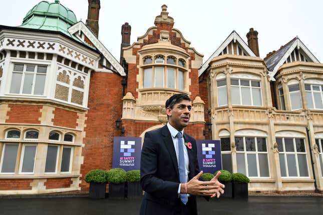 Britain&#39;s Prime Minister Rishi Sunak speaks to journalists upon his arrival for the second day of the UK Artificial Intelligence (AI) Safety Summit, at Bletchley Park, in Bletchley, England, Thursday, Nov. 2, 2023. U.S. Vice President Kamala Harris and British Prime Minister Rishi Sunak are set to join delegates Thursday at a U.K. summit focused on containing risks from rapid advances in cutting edge artificial intelligence. (Justin Tallis/Pool Photo via AP)