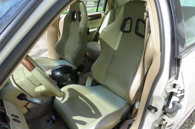 A photo of the front seats of the car